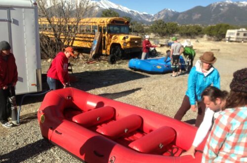 Whitewater rafting Guide training, pumping boats.