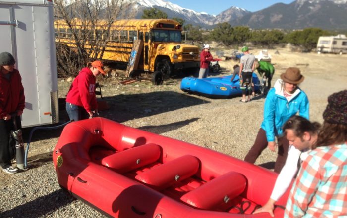 Whitewater rafting Guide training, pumping boats.