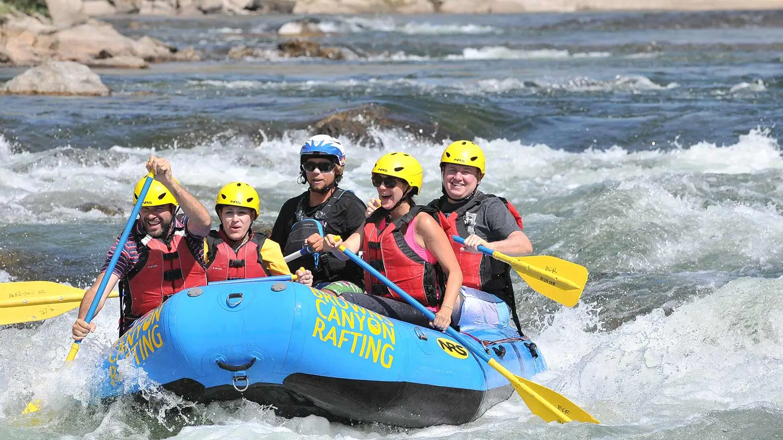 Group whitewater rafting through Browns Canyon on the Arkansas River near Buena Vista Colorado