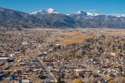 Aerial view of Buena Vista Colorado near the Arkansas River with Collegiate Peaks in the background